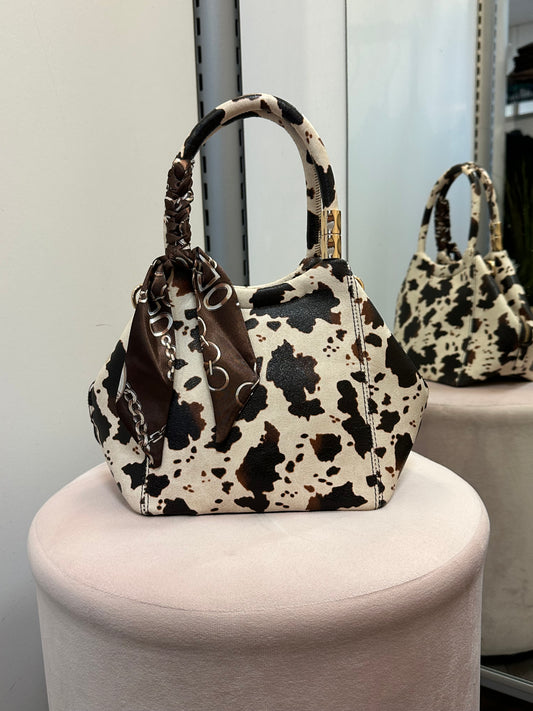 Pikkulaukku huivilla lehmä