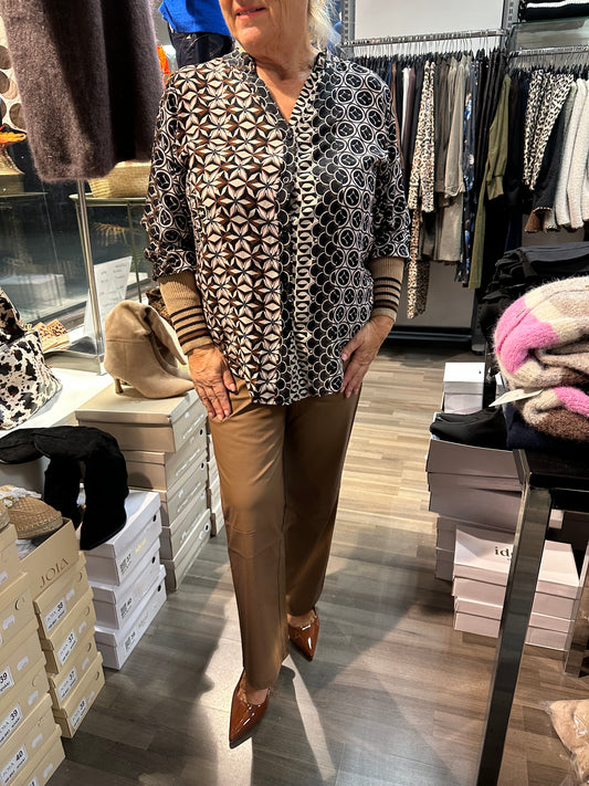 Viskoosipusero resorihihoilla