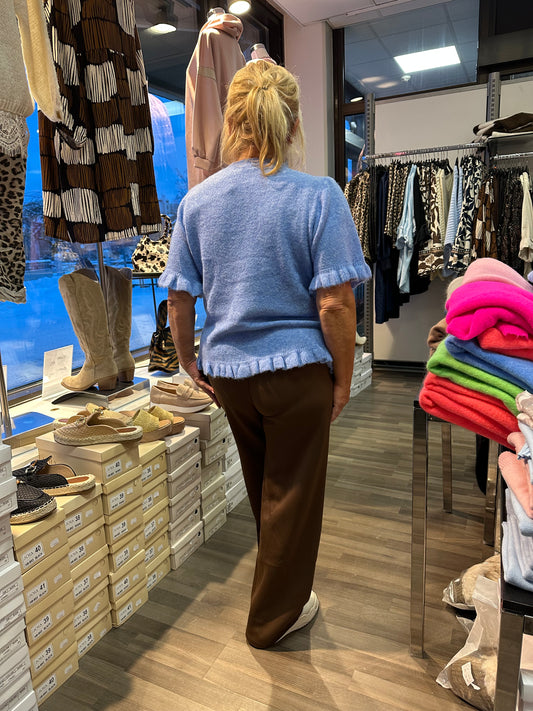 Neulepusero frillahelmalla sininen