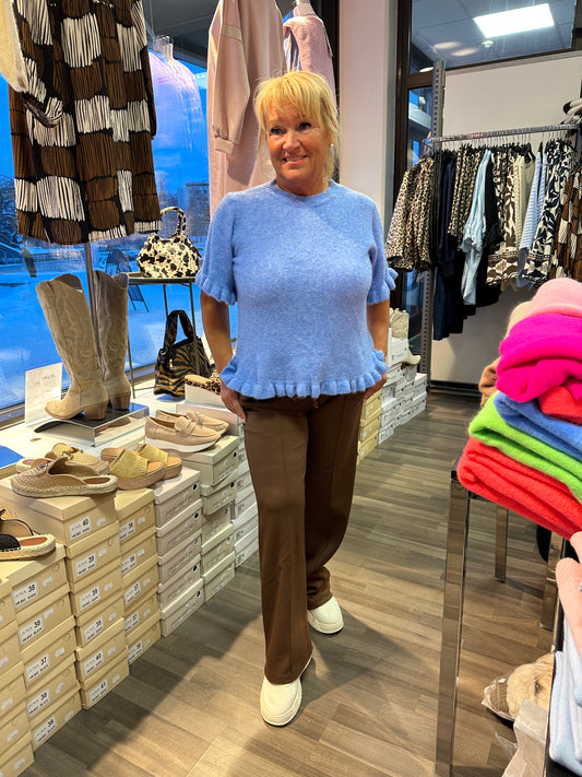 Neulepusero frillahelmalla sininen