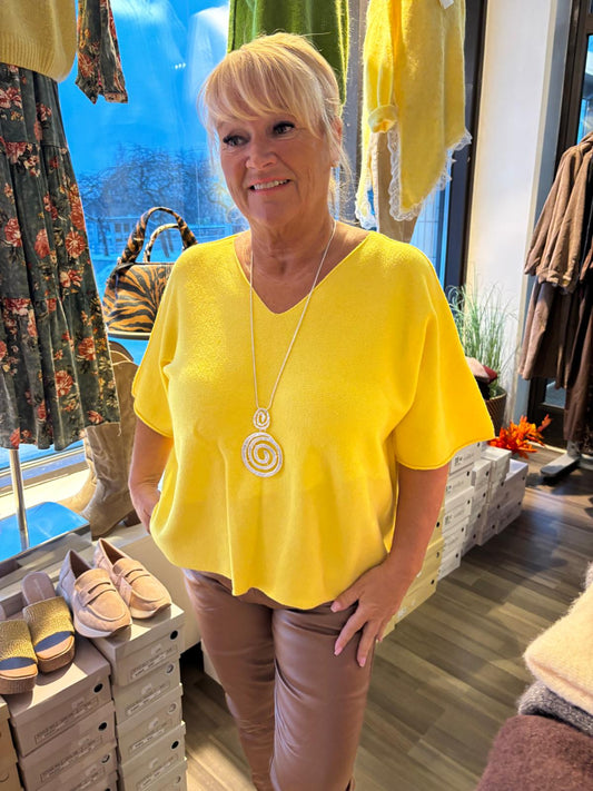 Laatikkoneule keltainen