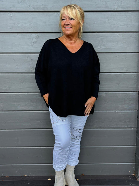 Reilumpi neule musta